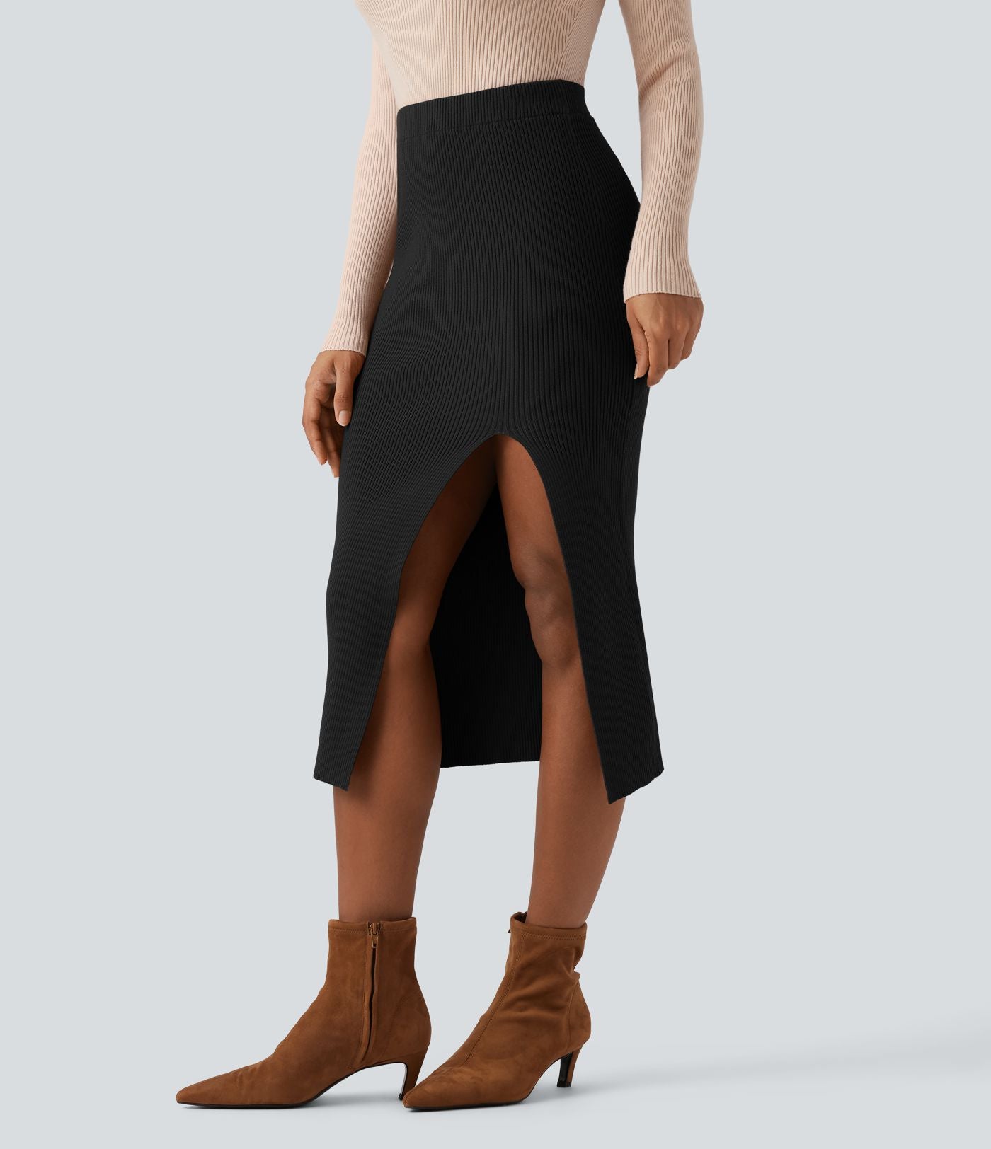 Jupe pull mi-longue moulante fendue taille haute