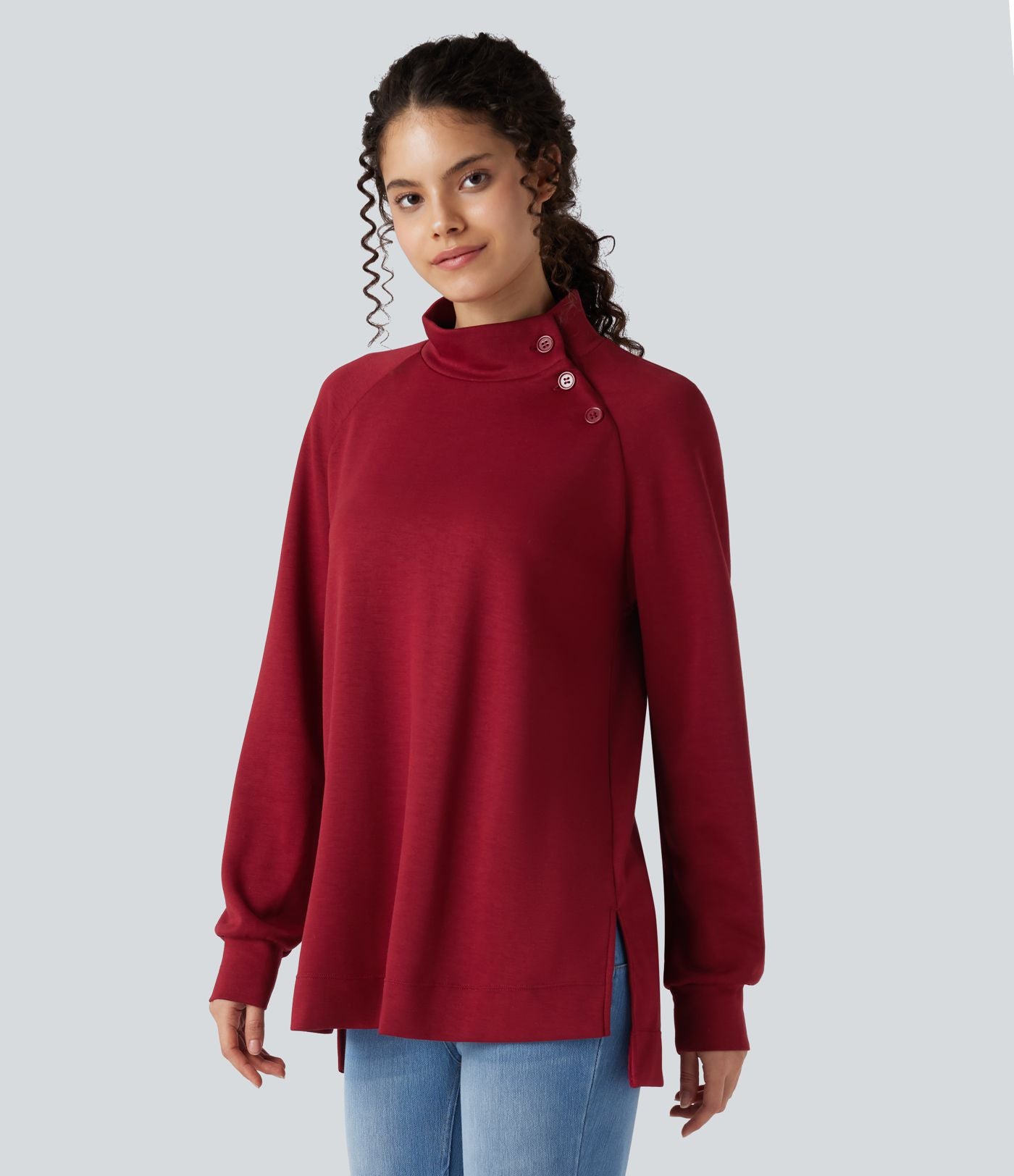 Sweat décontracté ample col montant à manches longues avec fentes et ourlet asymétrique