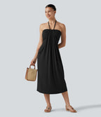 Robe midi de plage à col halter avec brassière intégrée, lien noué au dos et poches