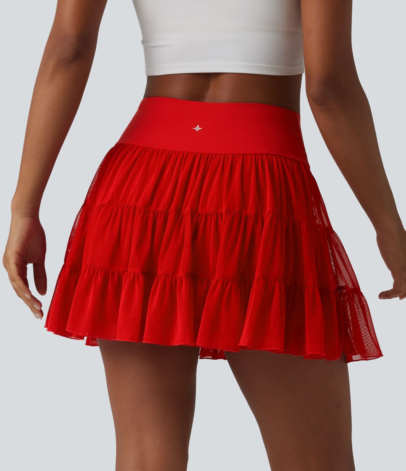 Jupe-short de tennis mini taille haute croisée fluide avec poches