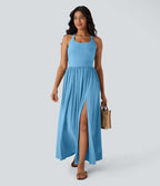 Robe longue fluide fendue avec poches latérales, dos nu et effet torsadé