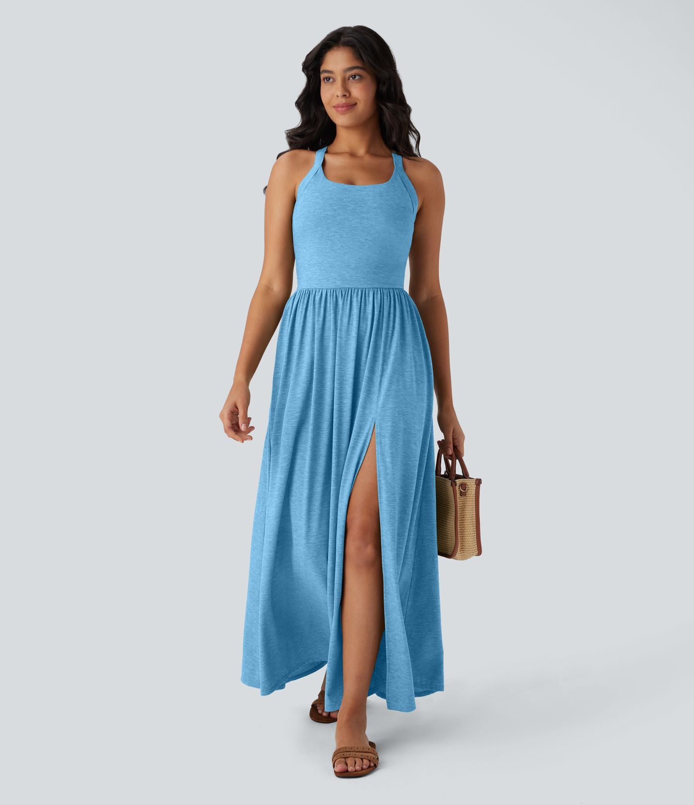 Robe longue fluide fendue avec poches latérales, dos nu et effet torsadé