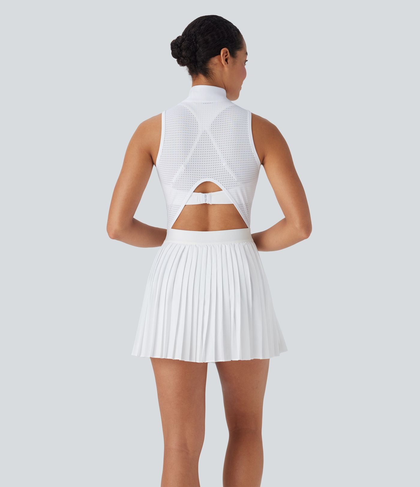 Robe de tennis courte 2-en-1 sans manches ajourée plissée à séchage rapide Breezeful™ avec poches latérales