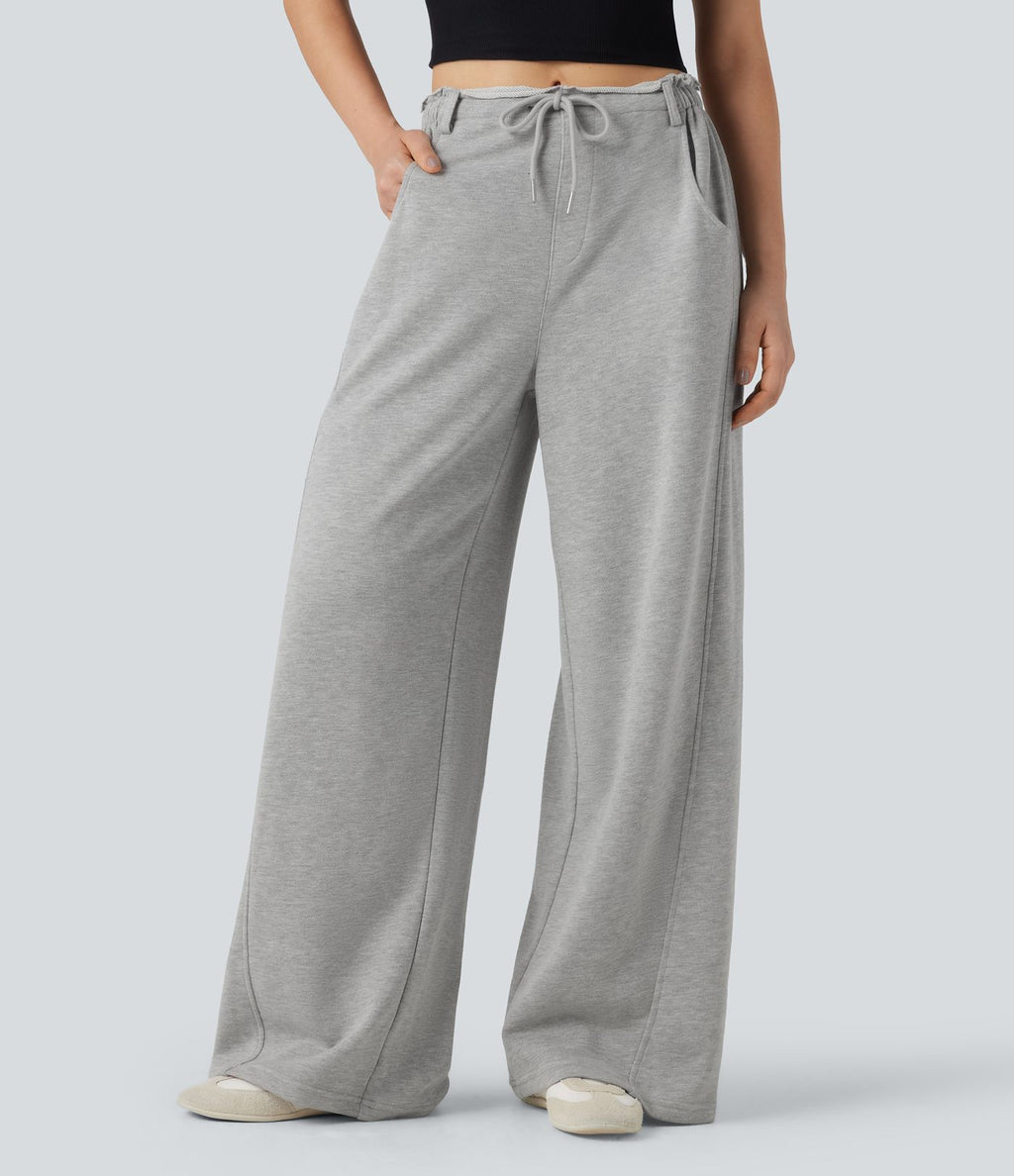 Pantalon jogging large taille mi-haute finition brute avec cordon de serrage et poches