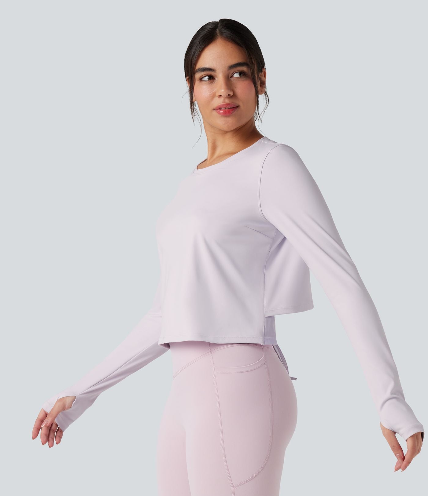 Top de sport yoga col rond manches longues mesh contrastant à découpes liens dans le dos avec trous pouces