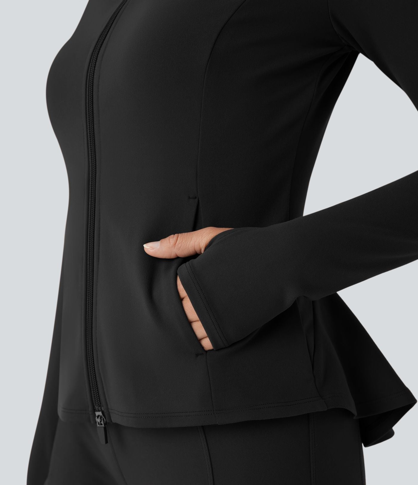 Veste ajustée col montant zippée avec passants pouces et ourlet à volants DayStretch avec poches