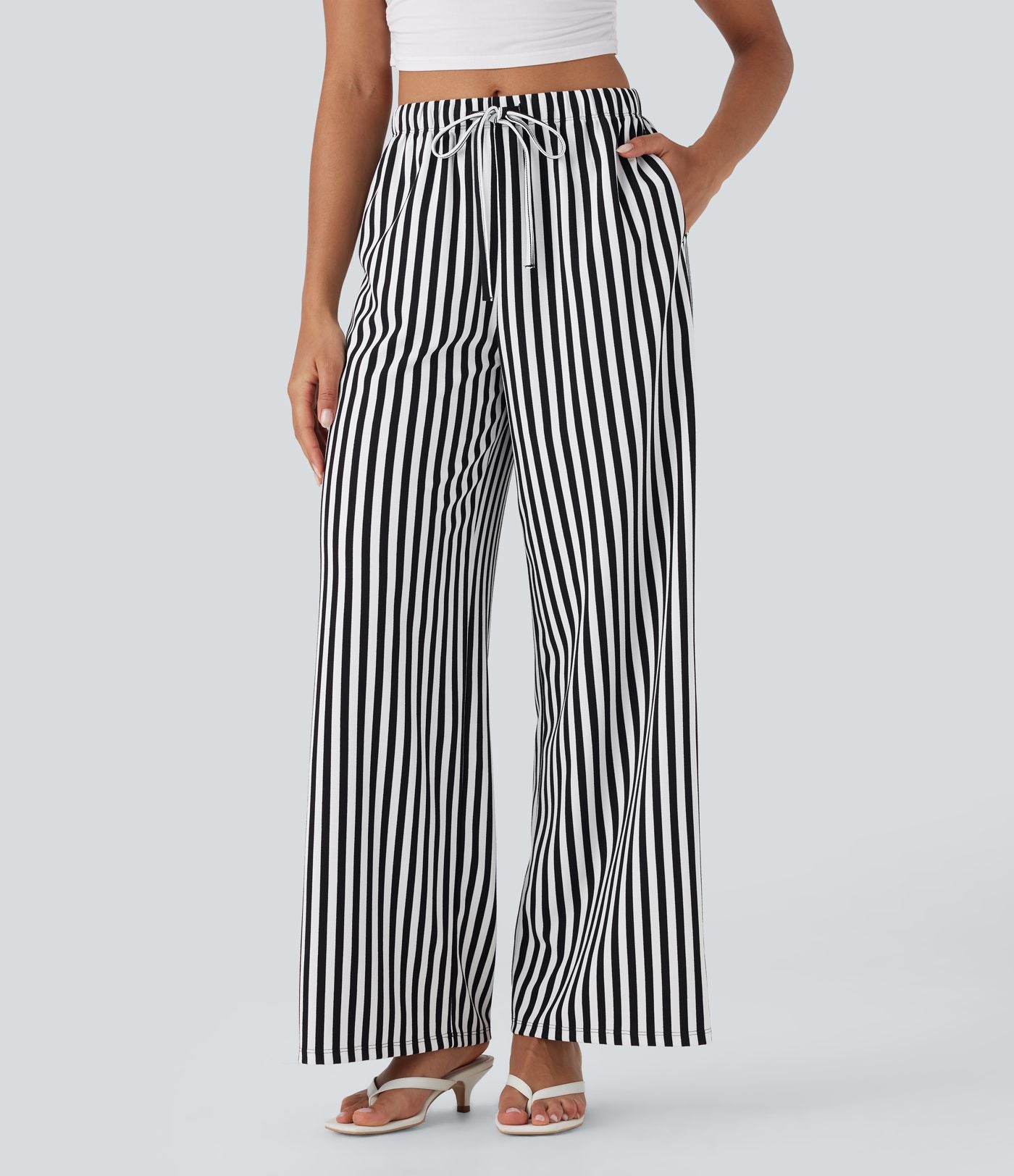Pantalon de vacances jambes larges taille haute en tissu gaufré à rayures avec cordon de serrage et poches