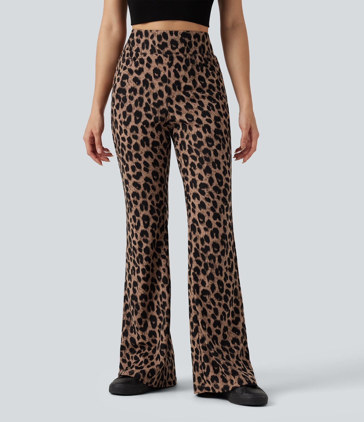 Pantalon flare taille haute en tissu gaufré imprimé léopard avec poches