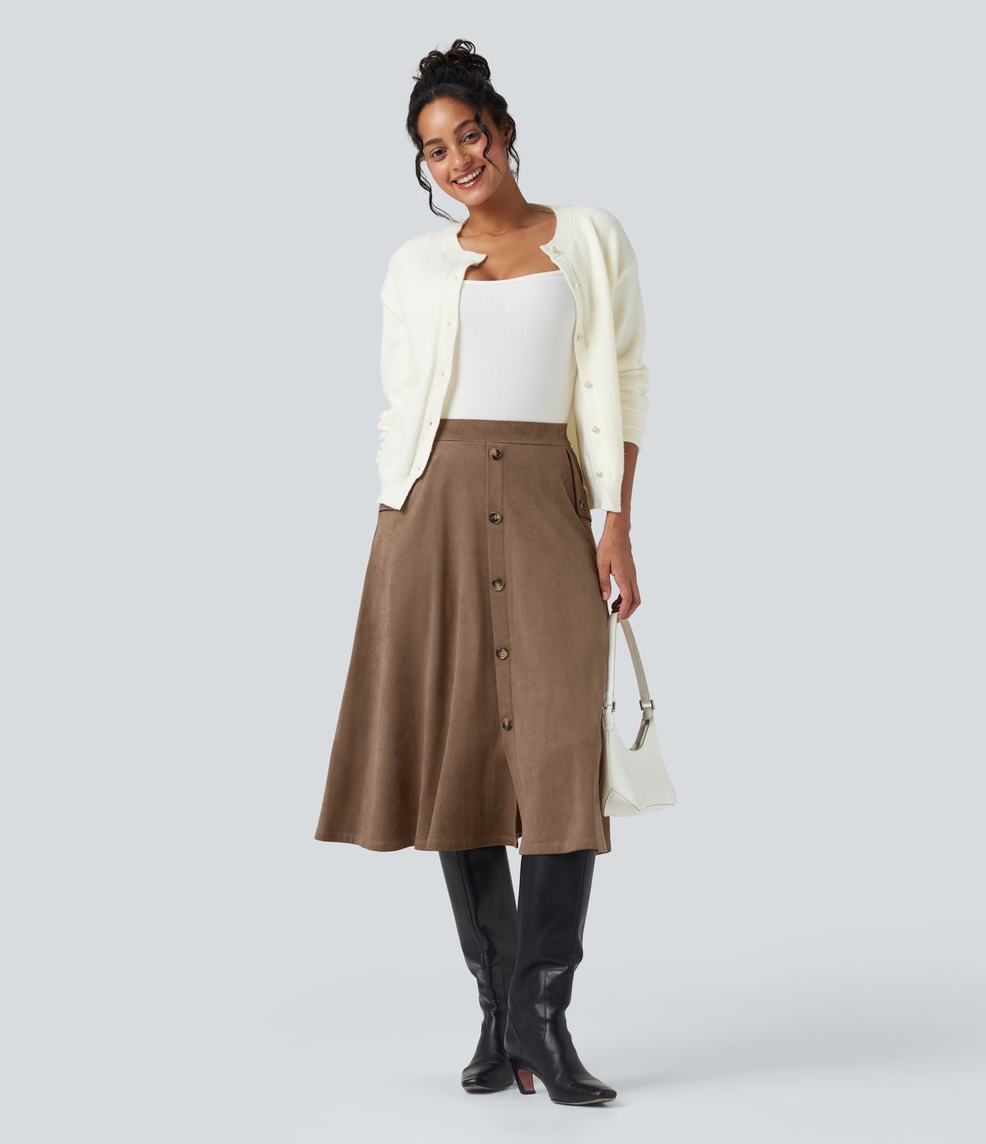 Jupe mi-longue évasée effet daim taille haute avec poches