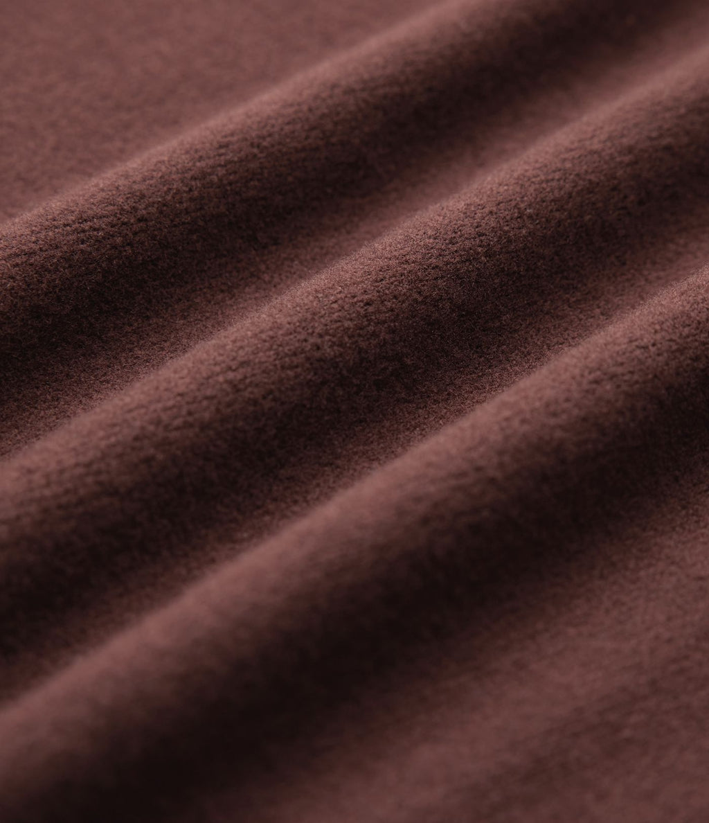 Robe fluide côtelée col V manches longues ceinturée mi-longue