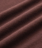 Robe fluide côtelée col V manches longues ceinturée mi-longue