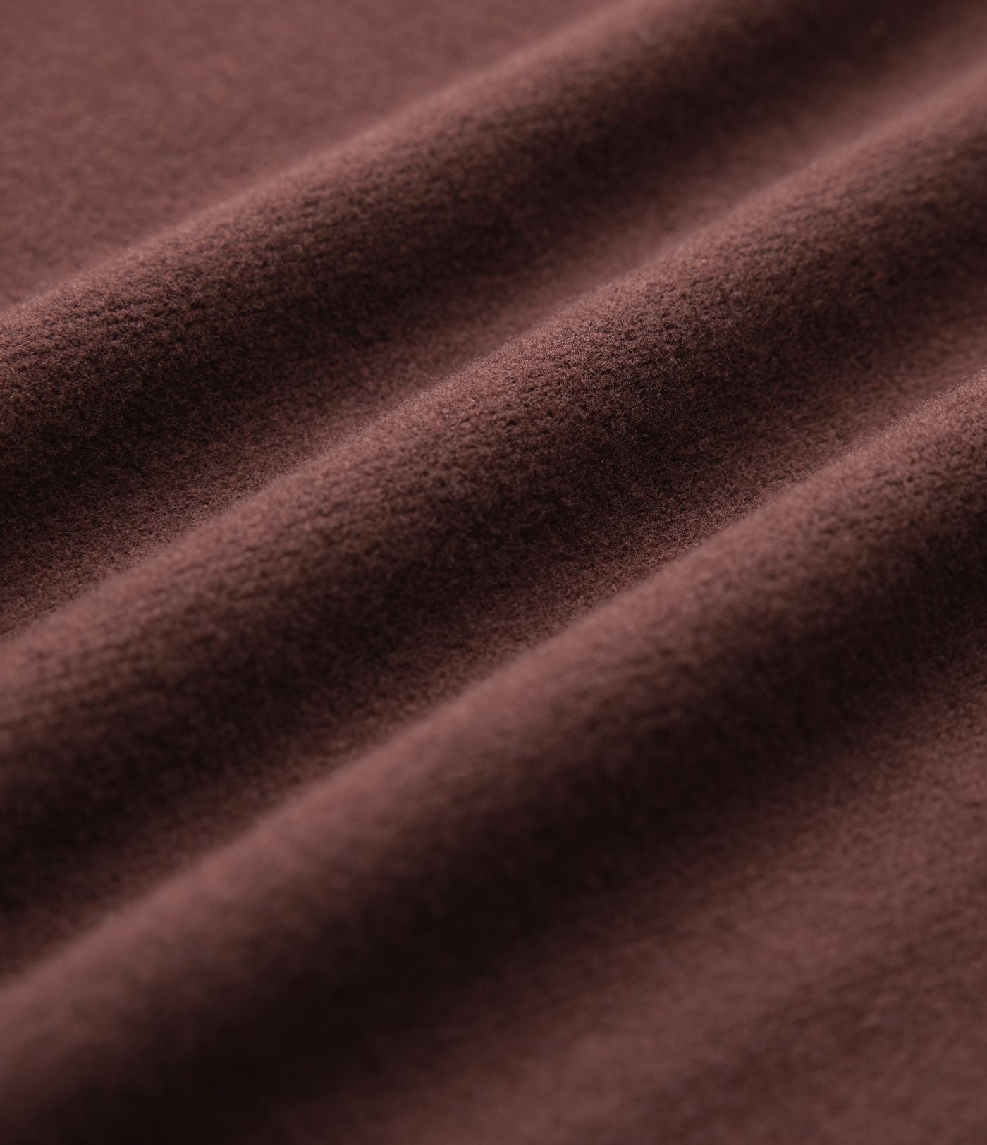 Robe fluide côtelée col V manches longues ceinturée mi-longue