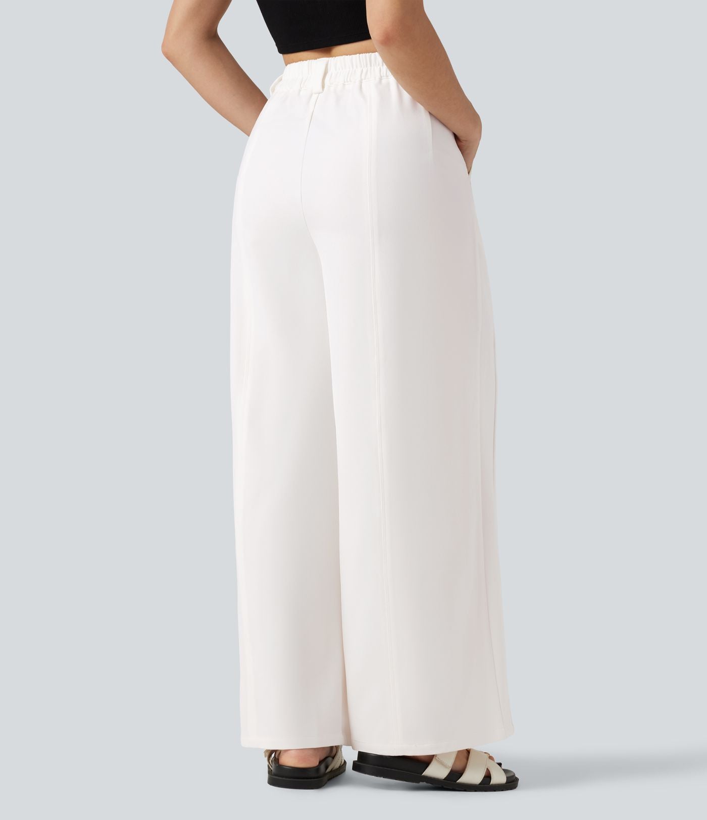 Pantalon tailleur large, taille moyenne, à poches