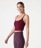Caraco de yoga court col rond échancré avec brassière intégrée et ourlet croisé