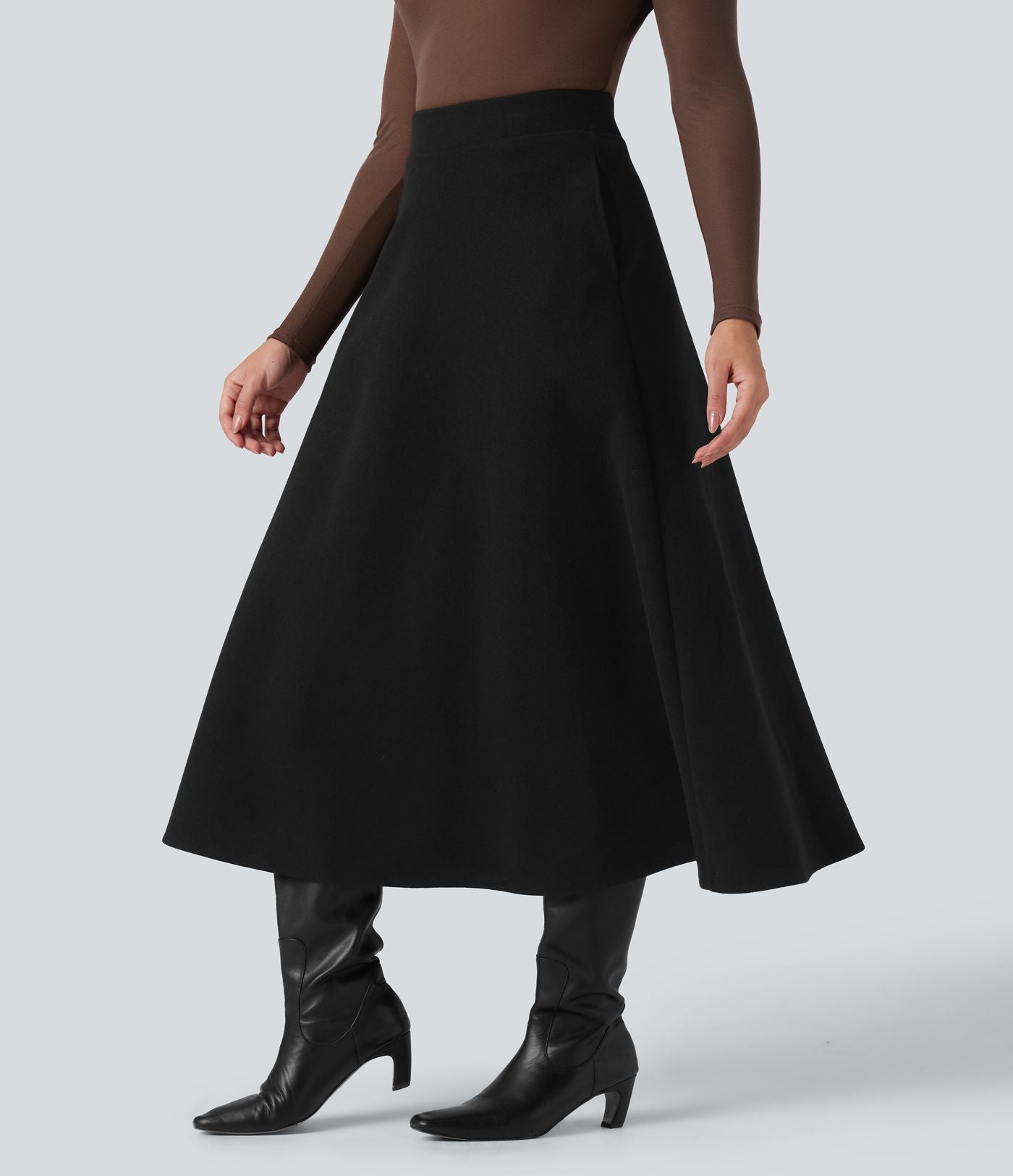 Jupe mi-longue évasée polaire taille haute avec poches
