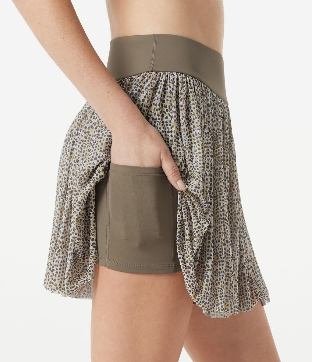 Jupe de sport mini 2-en-1 fluide taille mi-haute en mesh léopard avec poche