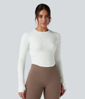 Haut de sport yoga col rond à manches longues avec passants pouces et ourlet arrondi sans couture Seamless Flow