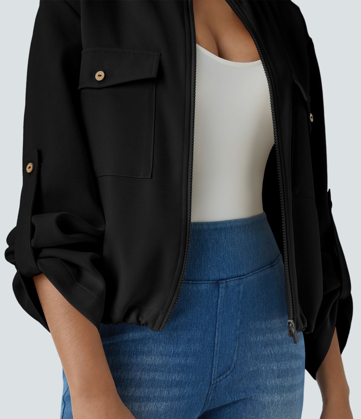 Blouson décontracté à col montant, manches retroussables, poches à rabat, cordon de serrage intérieur et fermeture éclair