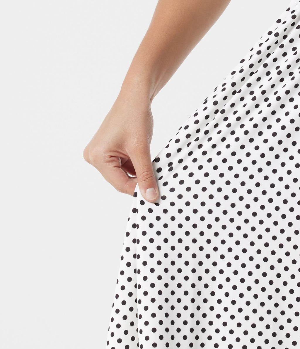Robe nuisette midi fluide à pois avec lien à nouer à l’avant