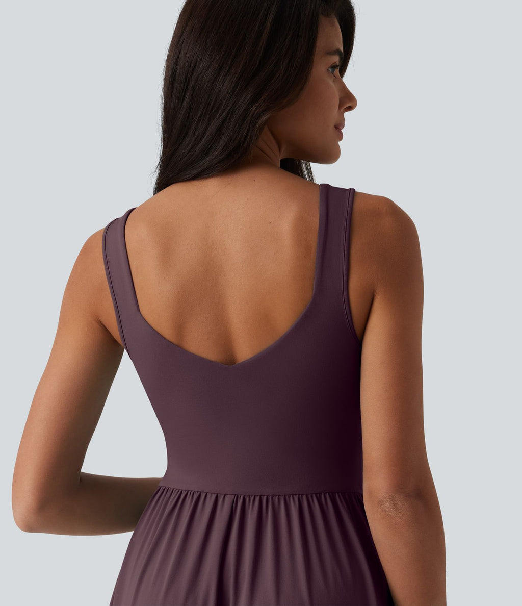 Robe midi fluide sans manches dos croisé, avec brassière intégrée (Bonnets E-G) et poches