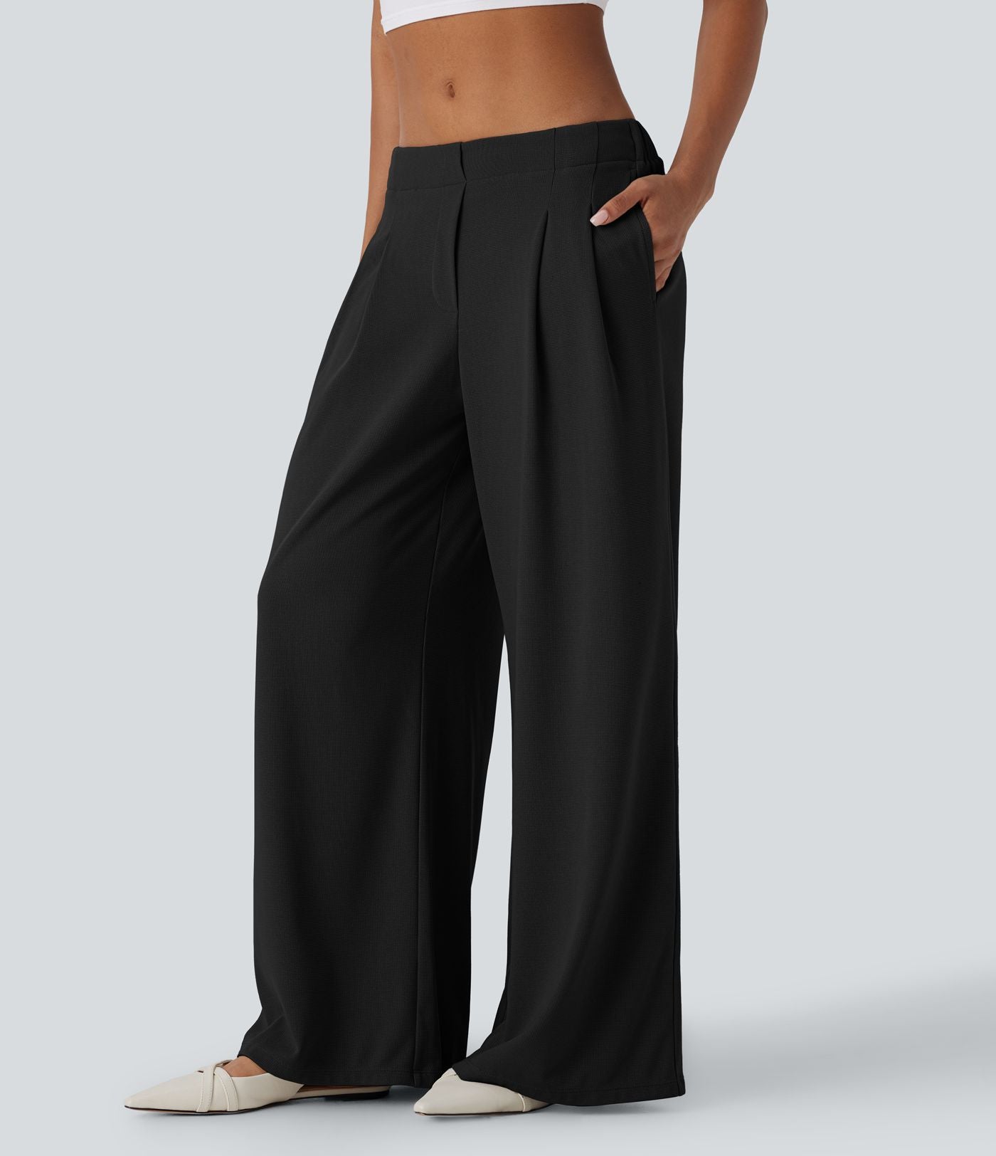 Pantalon décontracté taille basse à jambes larges en tissu gaufré avec poches latérales