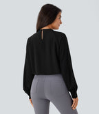 Blouse de travail à col montant avec dos ajouré, manches raglan et empiècements en mesh contrastant