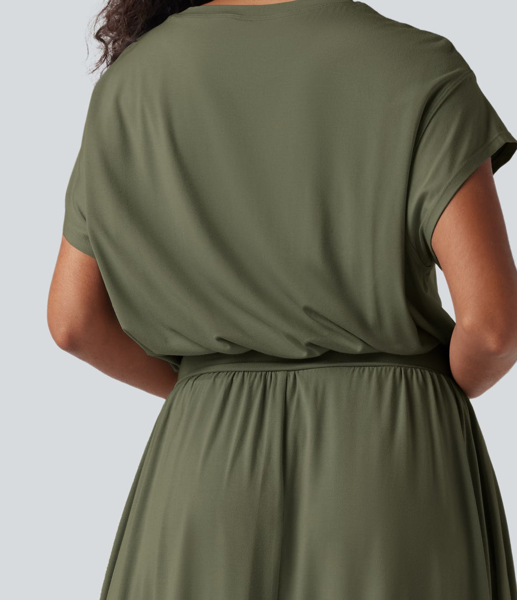 Robe de travail mi-longue fluide gainante à manches chauve-souris avec poches