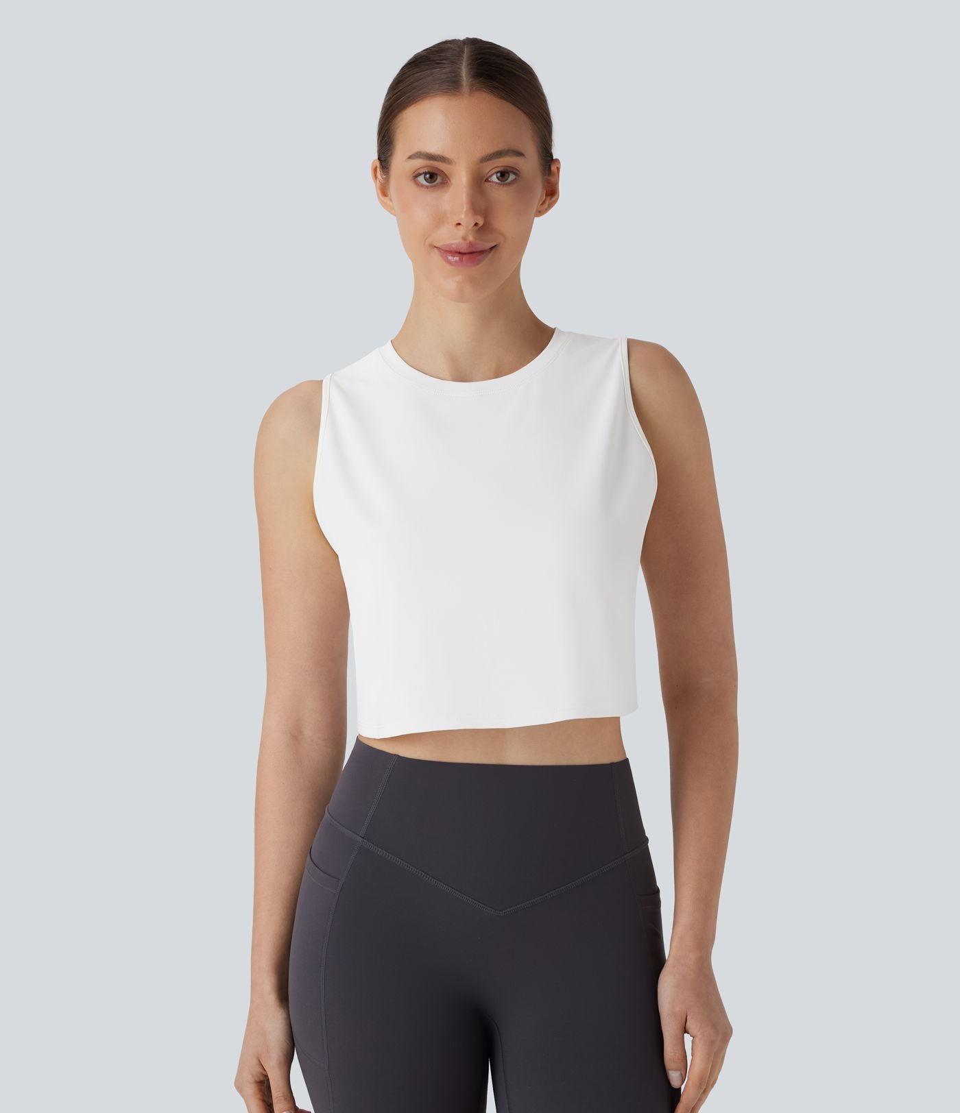 Débardeur Court de Yoga Uni à Ourlet Croisé avec Découpes