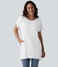 T-shirt décontracté à manches courtes et col bateau, coupe asymétrique, avec poches