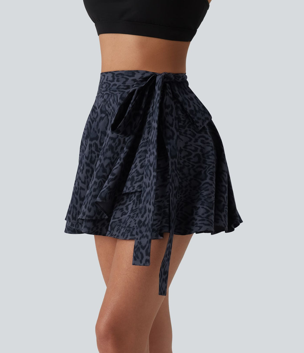 Jupe tennis mini fluide 2-en-1 taille haute imprimé léopard avec liens latéraux et poche