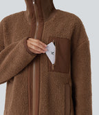 Veste de sport sherpa à manches longues avec ourlet asymétrique arrondi et poches