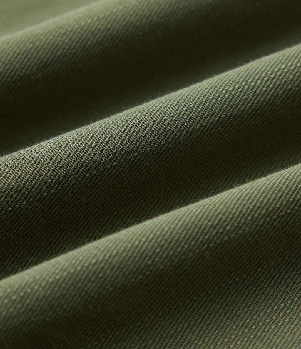 Blouse de villégiature à col Henley et manches 3/4, aspect lin.