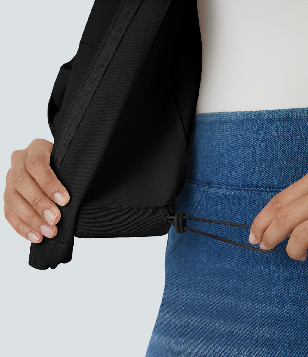 Blouson décontracté à col montant, manches retroussables, poches à rabat, cordon de serrage intérieur et fermeture éclair