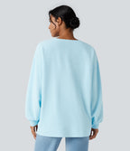 Sweat-shirt gaufré henley oversize manches longues avec poches