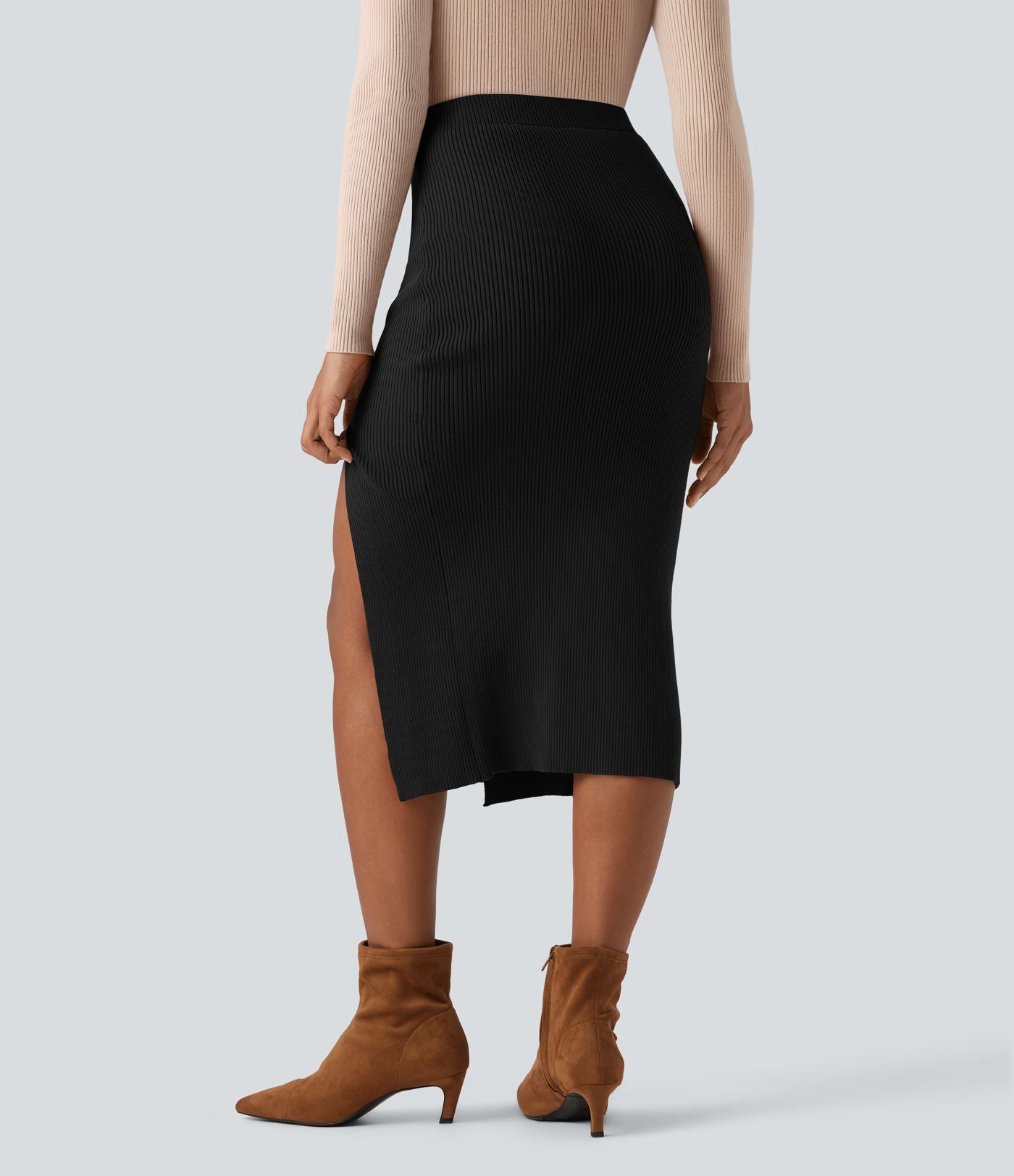 Jupe pull mi-longue moulante fendue taille haute