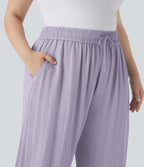 Pantalon décontracté grande taille large fluide taille haute effet lin avec cordon de serrage et poches
