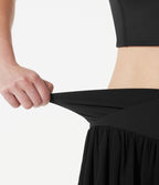 Jupe-short tennis mini fluide taille haute croisée en mesh à volants, avec poches