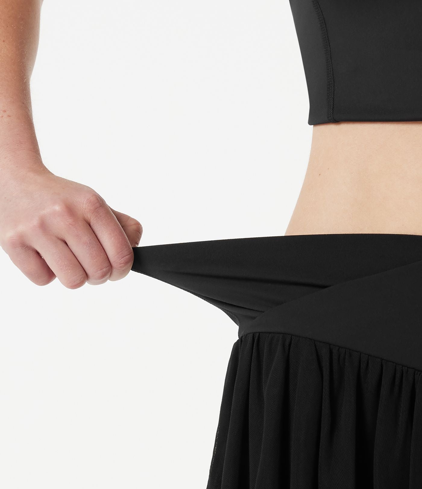Jupe-short tennis mini fluide taille haute croisée en mesh à volants, avec poches