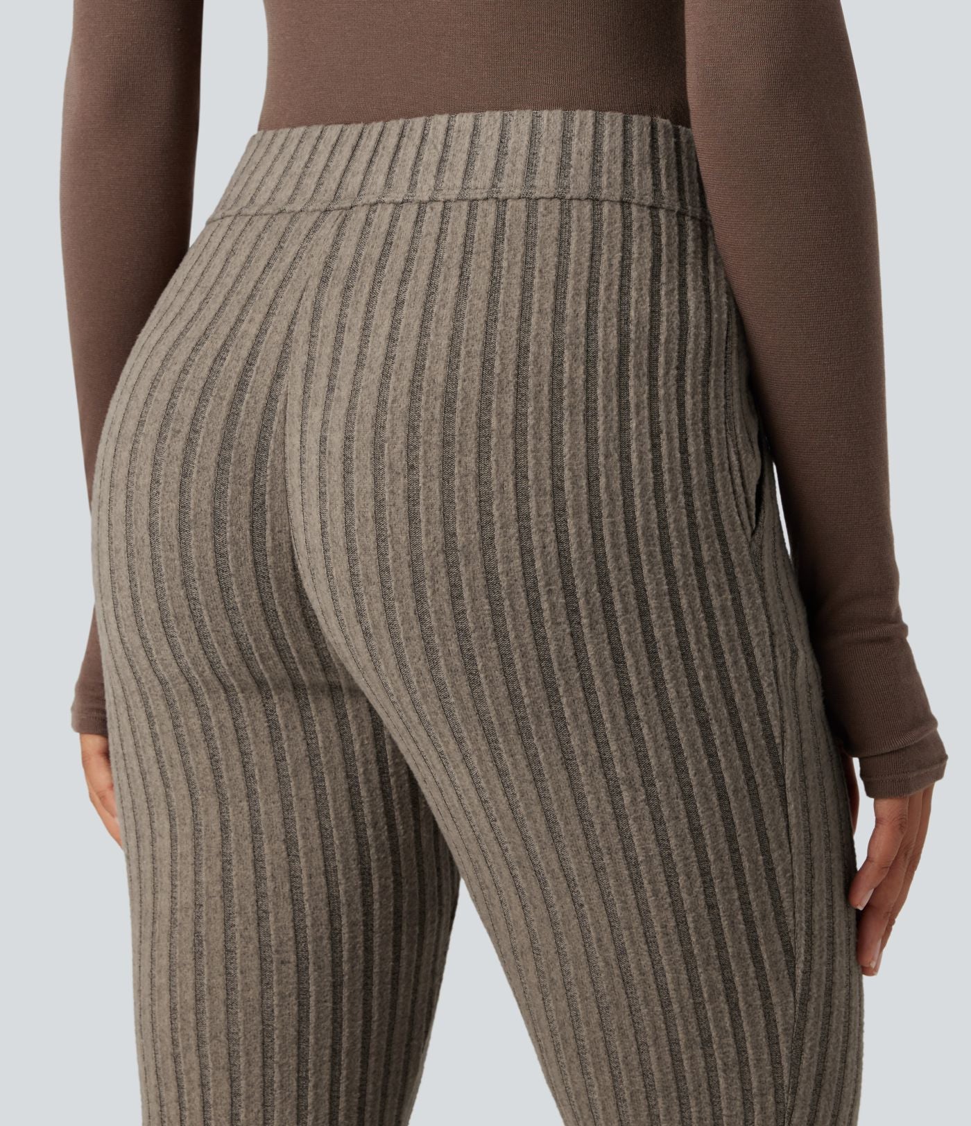Pantalon évasé côtelé taille mi-haute boutonnage ourlet fendu avec poches