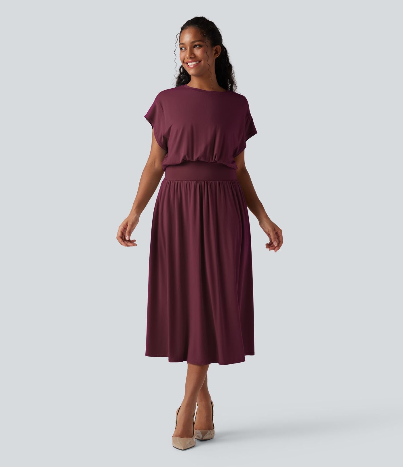 Robe de travail mi-longue fluide gainante à manches chauve-souris avec poches