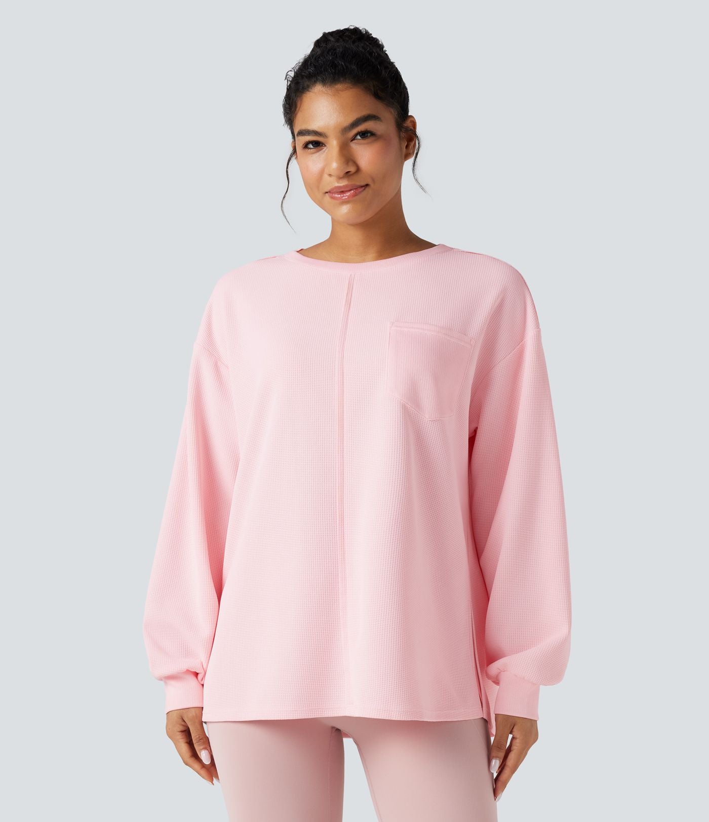 Sweat-shirt gaufré oversize col rond manches longues ourlet fendu avec poches