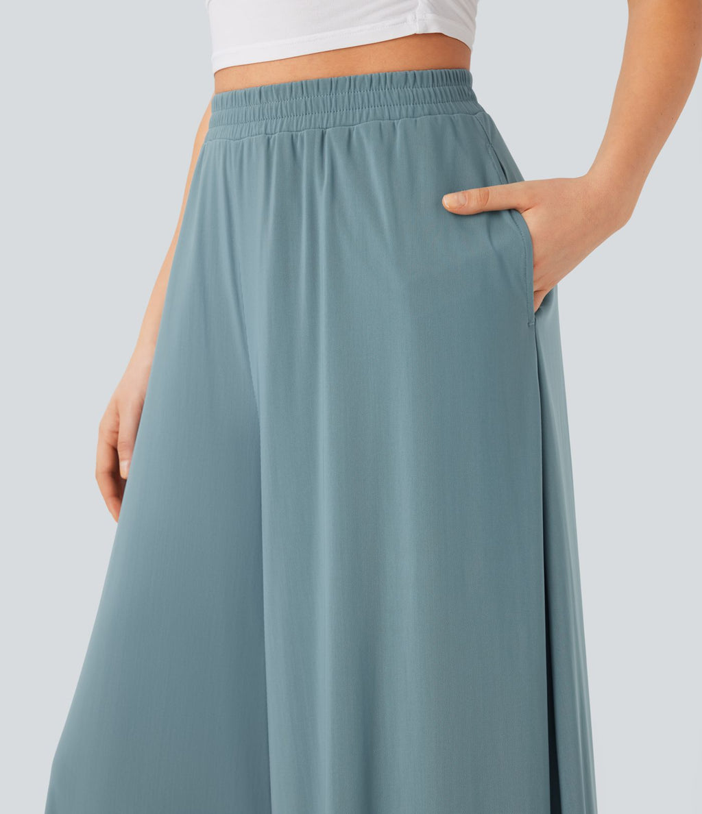 Pantalon fluide et ample avec superposition en mesh, poches latérales et taille haute