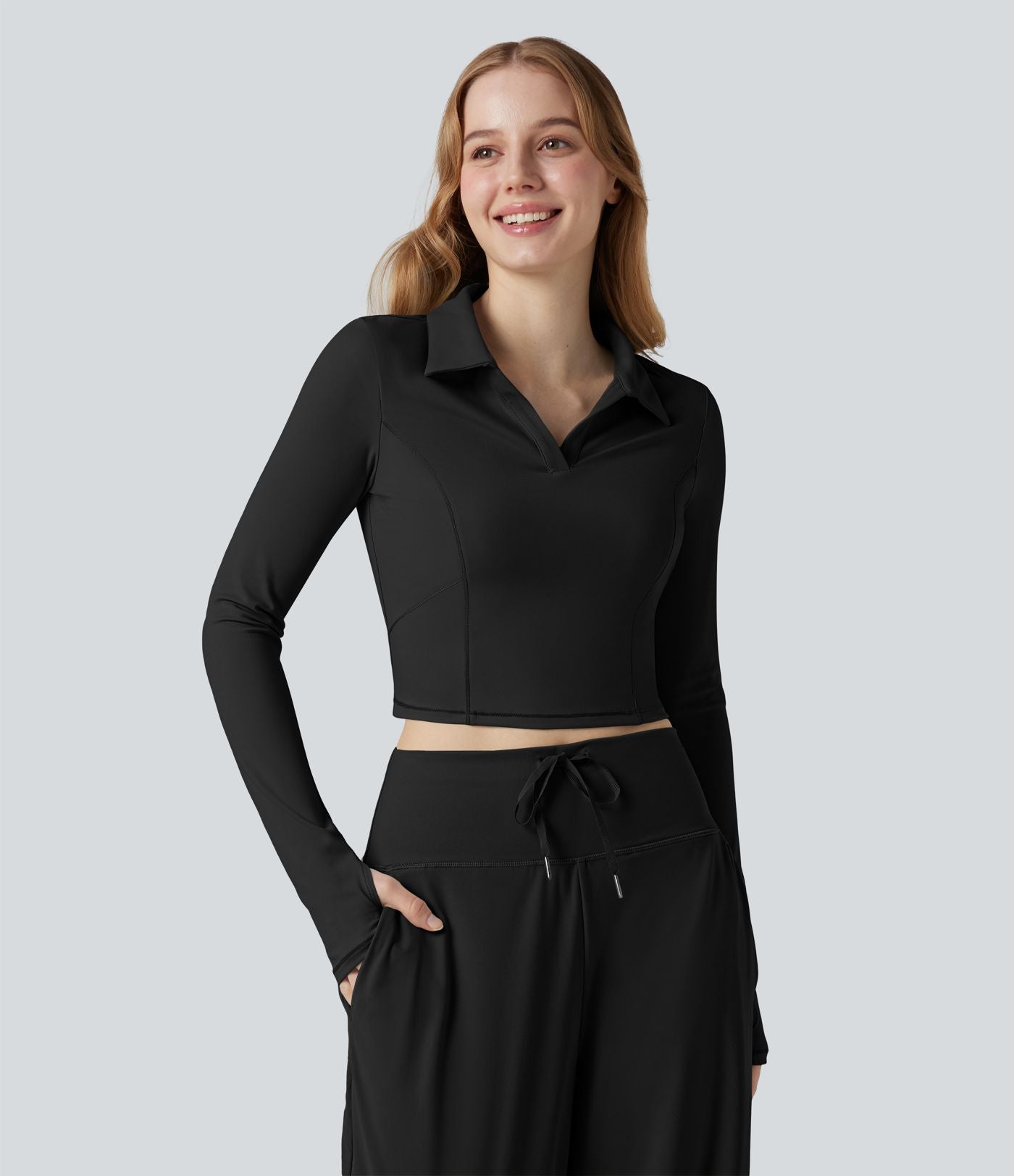 Top de sport tennis SoftlyZero™ Plush court col polo manches longues avec trous pouces