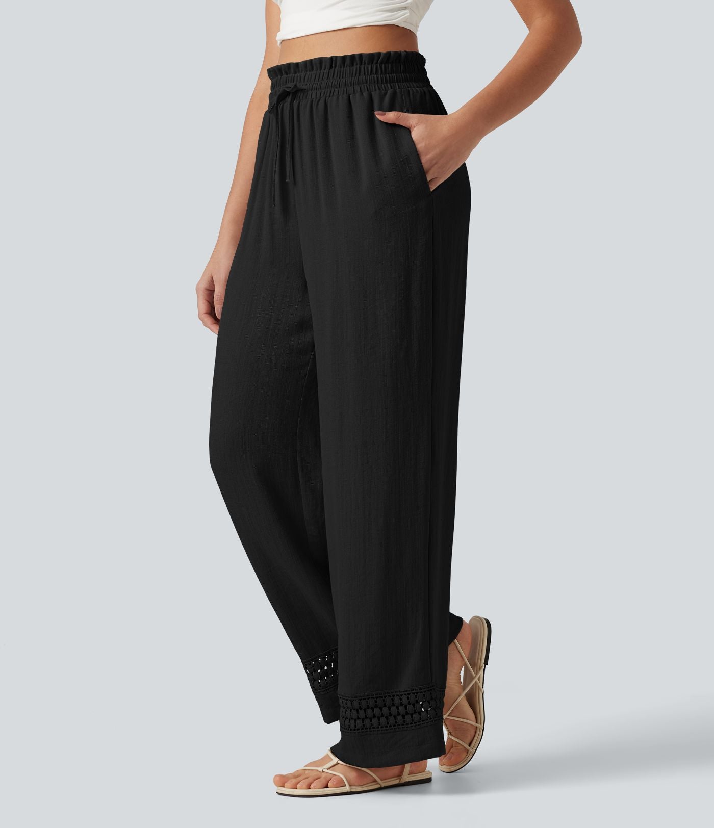 Pantalon effet lin taille haute avec cordon de serrage, bord volanté et poches