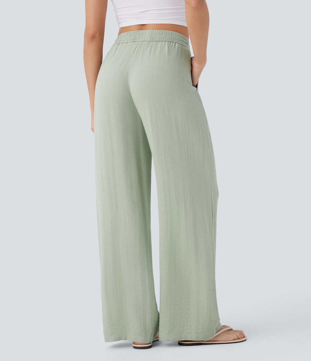 Pantalon large fluide taille haute avec cordon de serrage, poches latérales et aspect lin