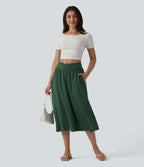 Jupe midi casual fluide croisée taille haute avec poches