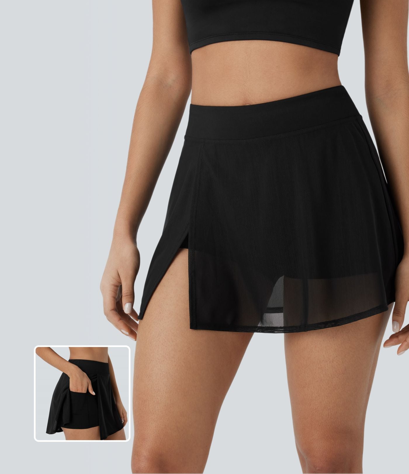 Mini-jupe de yoga taille haute avec short intégré, poches latérales et empiècements en maille contrastée avec fentes