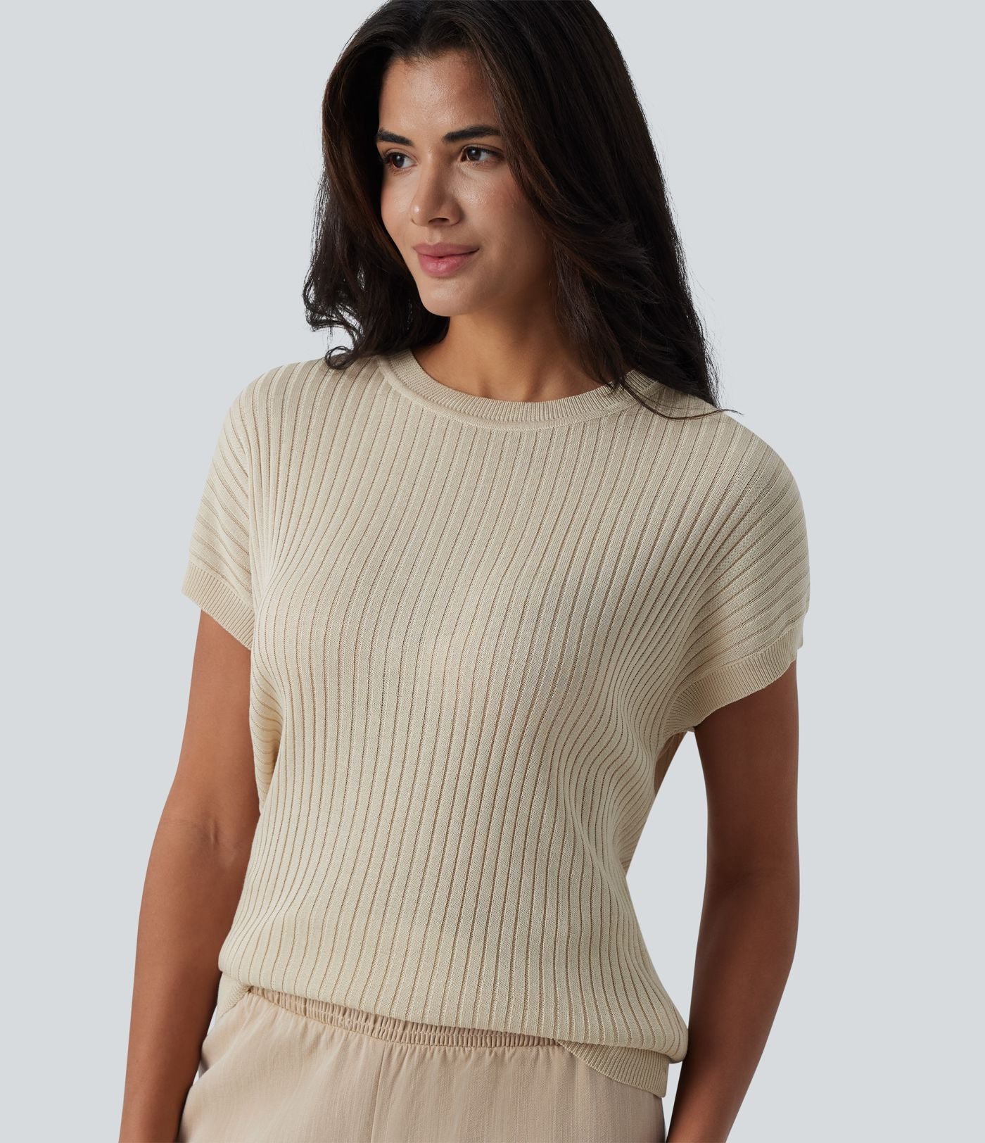 Pull casual col rond manches chauve-souris croisé dos nu