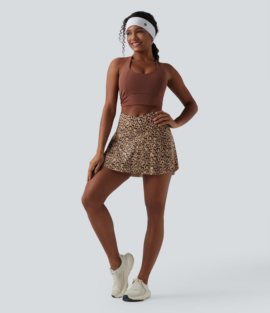Jupe-short de tennis mini taille haute croisée imprimé léopard avec poches
