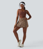 Jupe-short de tennis mini taille haute croisée imprimé léopard avec poches